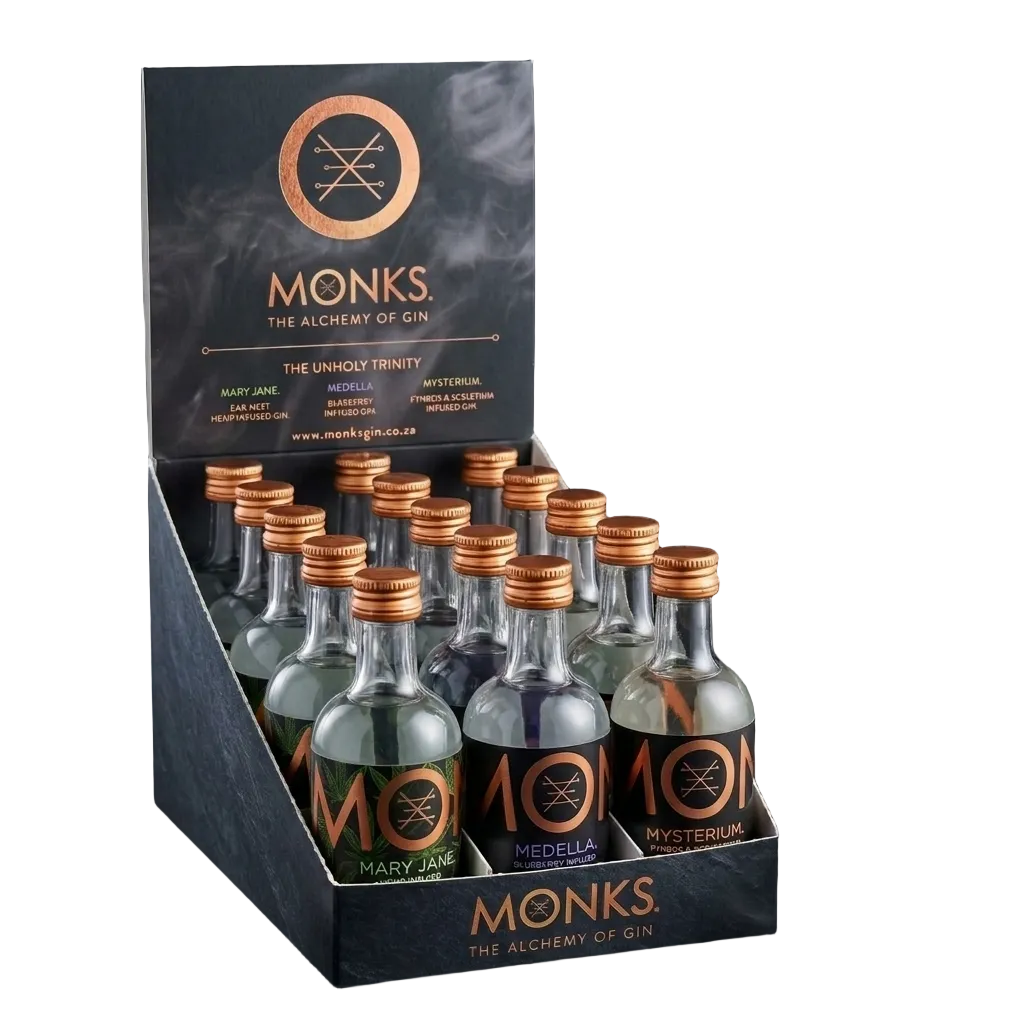 Display of Monks gin bottles with packaging on a black background